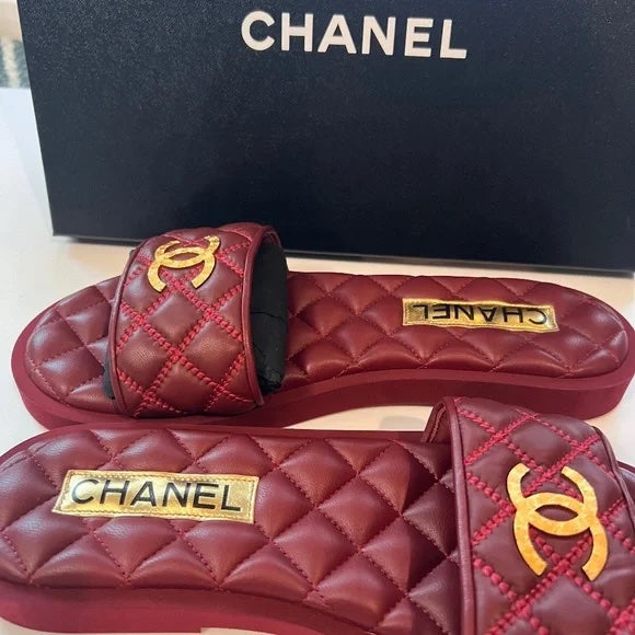 CHANEL INTERLOCKING CC LOGO QUILTED LAMBSKIN MULES