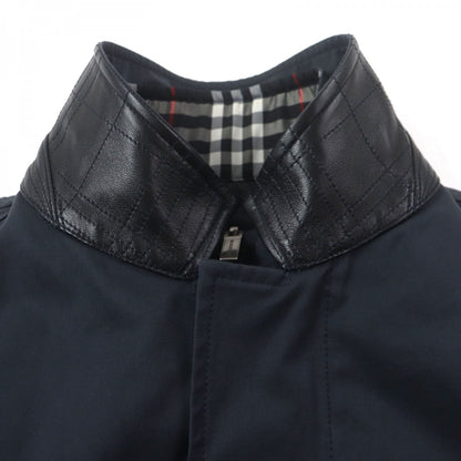 BURBERRY LONDON Military coat Main: 65% cotton, Main: 25% polyester, Main: 10% nylon, Leather part: sheepskin, Lining: cupra, : 10% nylon Lining: cupra : polyester Navy mens M
