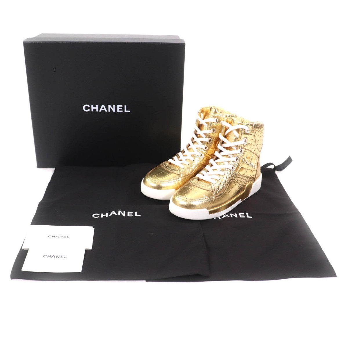 CHANEL High cut sneakers 19A G35079 leather gold 37
