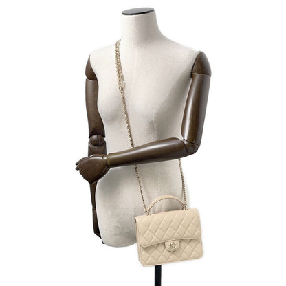 CHANEL Matelasse Top Handle Mini Chain Backpack Beige Lambskin
