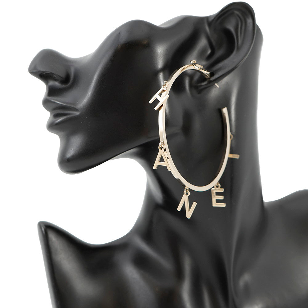 CHANEL Logo Icon motif hoop earrings Metal