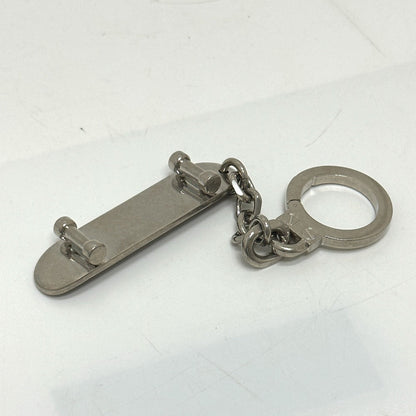 CELINE key ring metal black skateboard mens