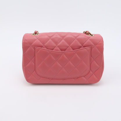 Chanel Classic Flap Rectangular Mini Pink Lambskin Leather Gold Hardware with Charms