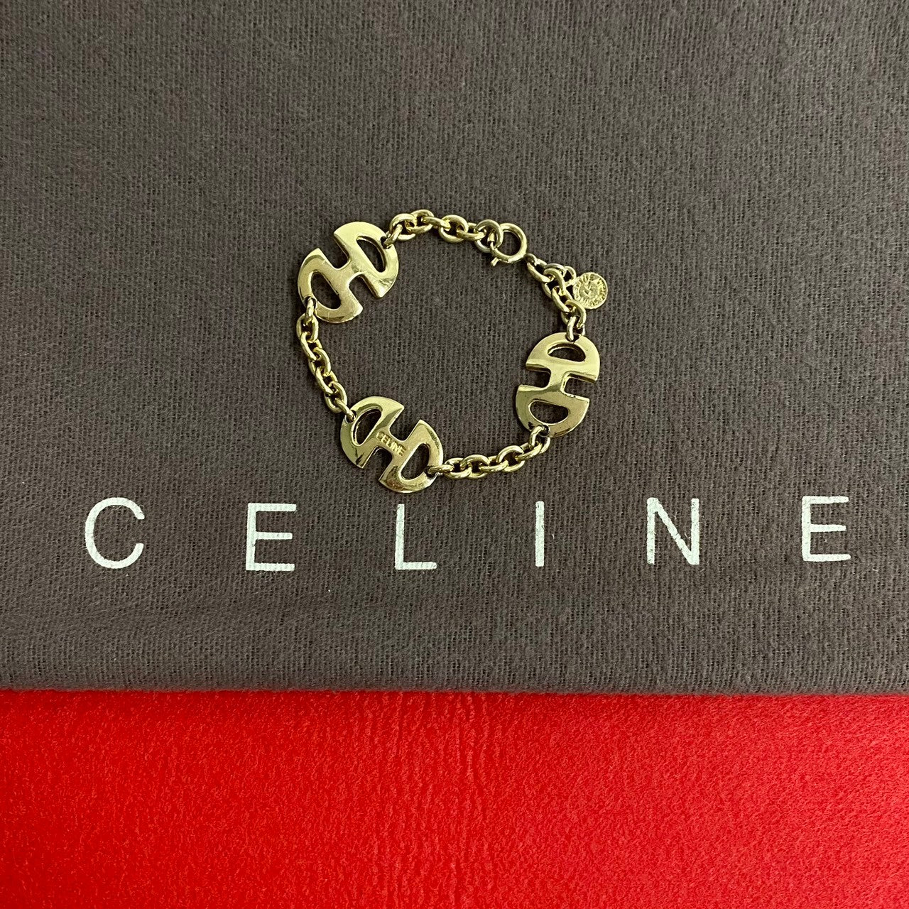 CELINE bracelet Gold Plated gold logo motif Women