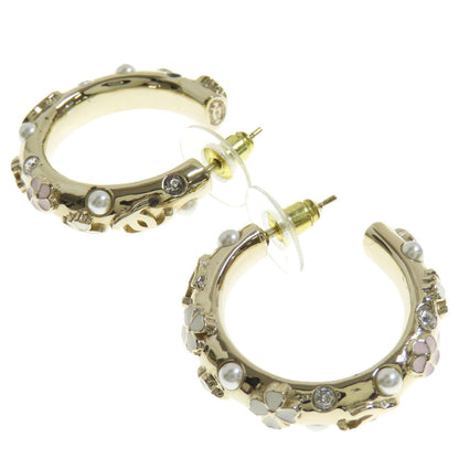 CHANEL Pierce metallic gold Hoop earrings with flower motif