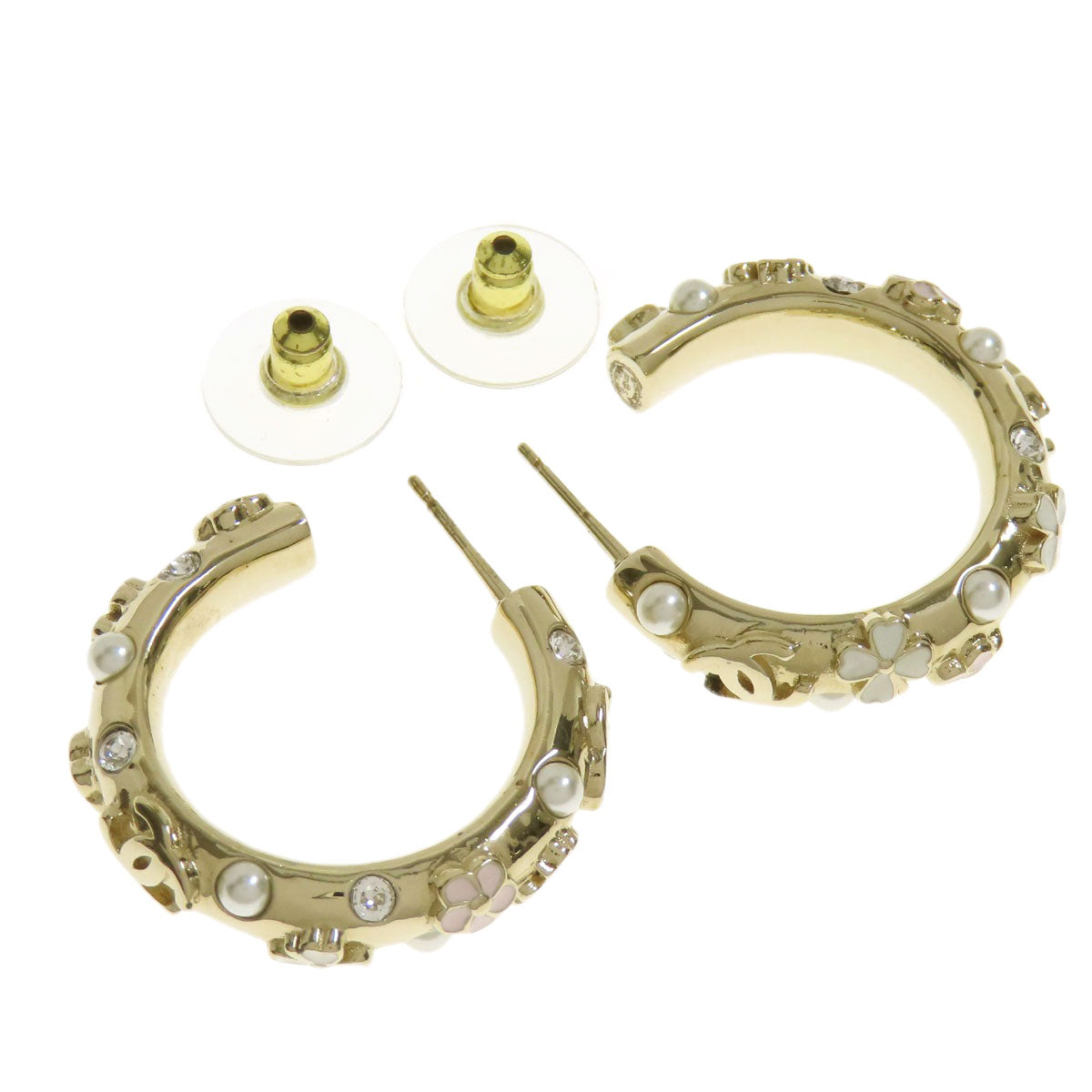 CHANEL Pierce metallic gold Hoop earrings with flower motif