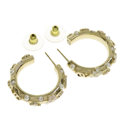 CHANEL Pierce metallic gold Hoop earrings with flower motif