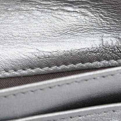 Chanel Black Lambskin Camellia Embossed Large Flap Wallet