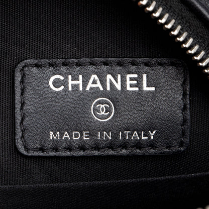 Chanel Black Caviar Camellia Embossed Round Clutch