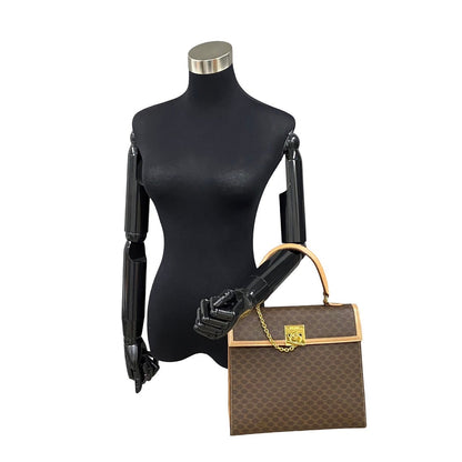 CELINE Handbag Leather, PVC Brown Macadam Blason Triomphe logo ring Metal Women