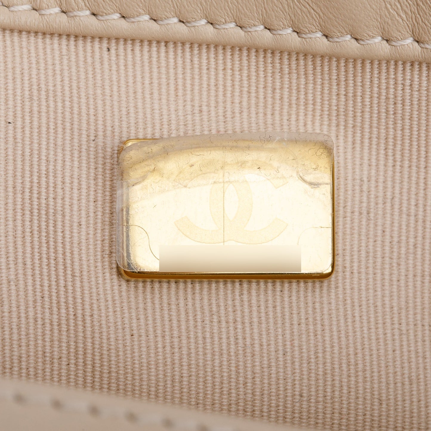Chanel 2025 Beige Quilted Lambskin Top Handle Flap Pearl Purse
