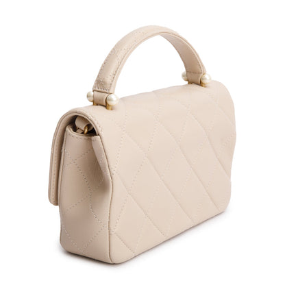 Chanel 2025 Beige Quilted Lambskin Top Handle Flap Pearl Purse