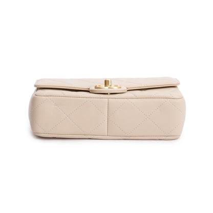 Chanel 2025 Beige Quilted Lambskin Top Handle Flap Pearl Purse