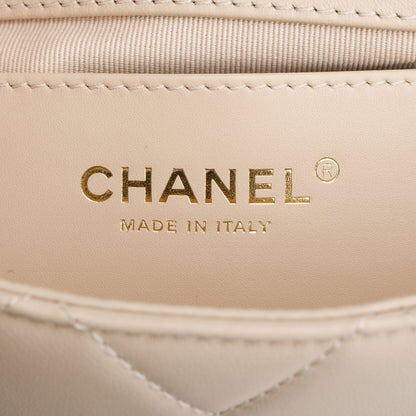 Chanel 2025 Beige Quilted Lambskin Top Handle Flap Pearl Purse