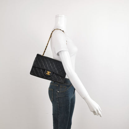 Chanel Classic Flap Vintage Black Lambskin Leather with 24k Gold Hardware