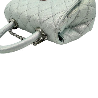 CHANEL Coco Extra Mini Top Handle Iridescent Caviar Leather Crossbody Bag Light Blue