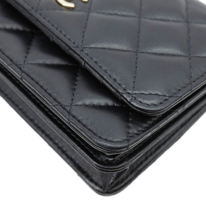CHANEL Camellia Bow Mini Quilted Leather WOC Crossbody Bag Black