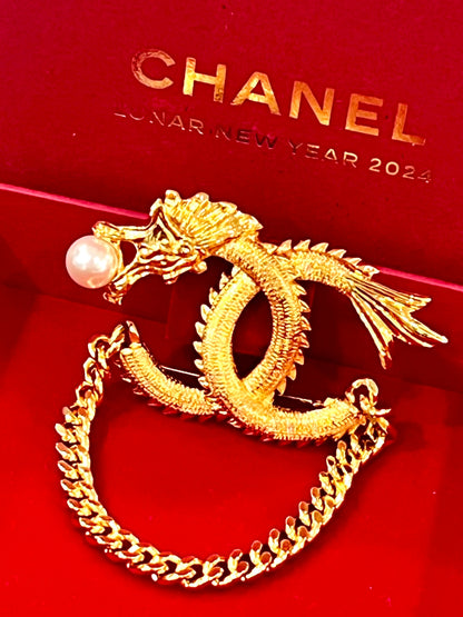 CHANEL CC LOGO LUNAR NEW YEAR DRAGON BROOCH