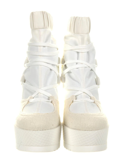 CHANEL INTERLOCKING CC LOGO LACE UP BOOTS