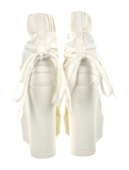 CHANEL INTERLOCKING CC LOGO LACE UP BOOTS