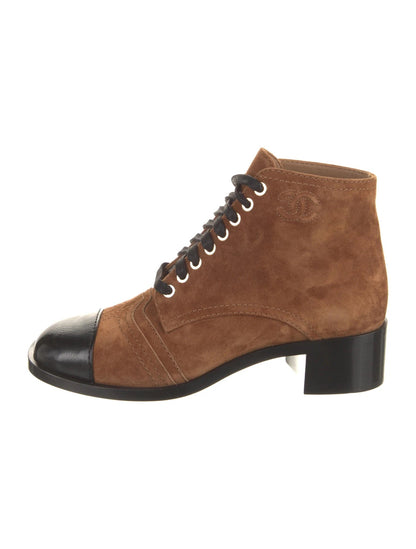 CHANEL INTERLOCKING CC LOGO LACE UP BOOTS