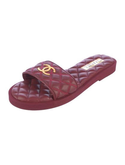 CHANEL INTERLOCKING CC LOGO QUILTED LAMBSKIN MULES