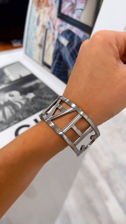 CHANEL METAL LOGO CUFF BRACELET
