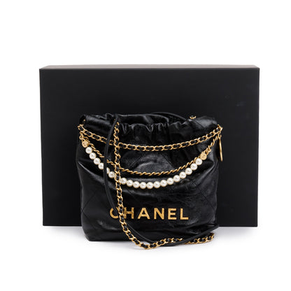 Chanel 2023 Black Shiny Calfskin Leather Mini Pearl Chanel 22