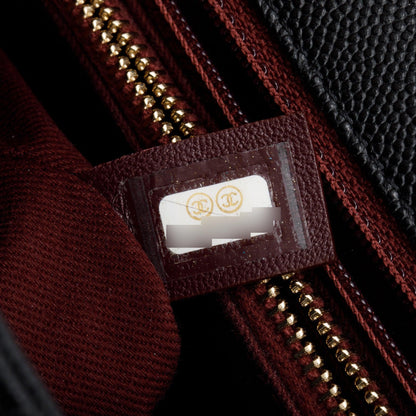 Chanel Black Quilted Caviar Leather Medium Coco Handle Bag
