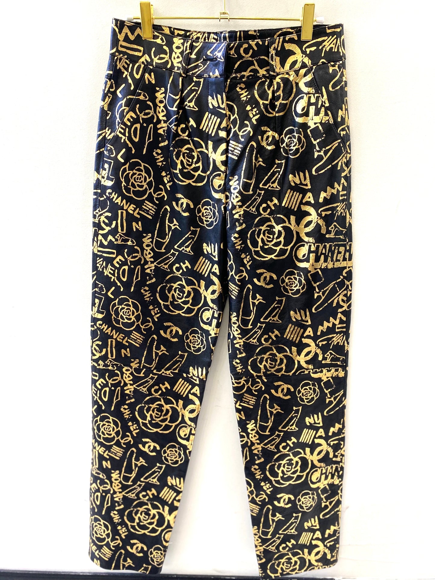 CHANEL CC ALLOVER LOGO LEATHER TROUSERS