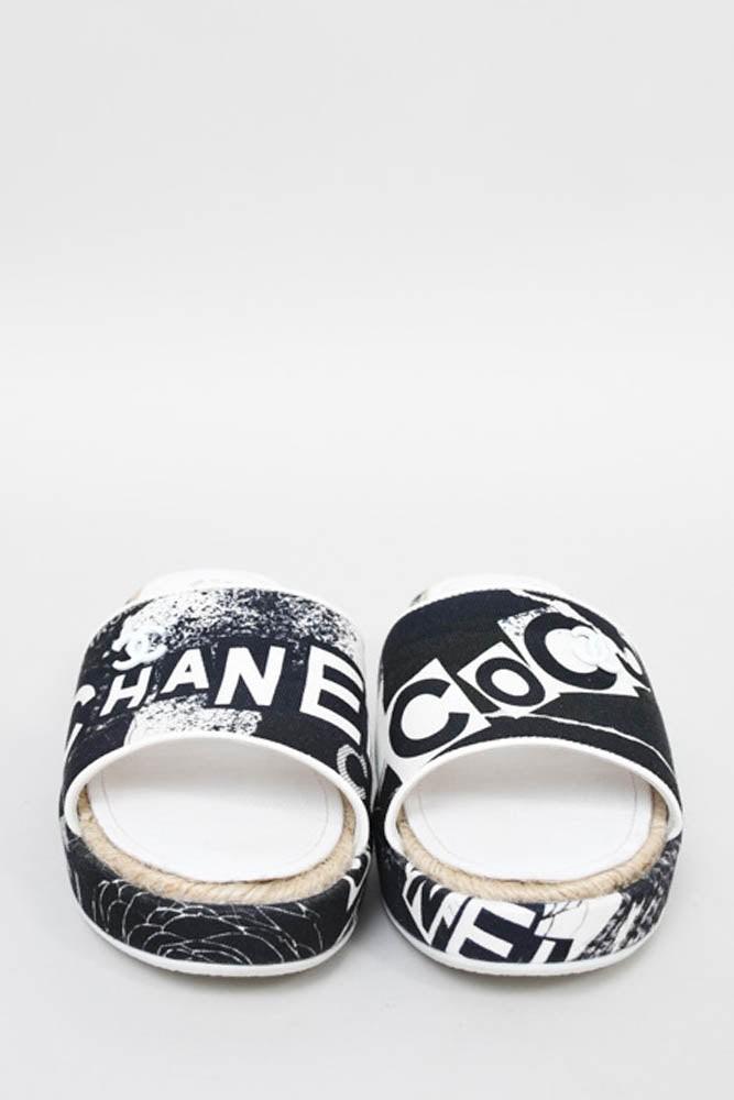CHANEL COCO SIGNATURE PRINTED PLATFORM MULE SLIDES