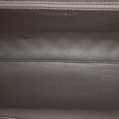 Chanel CC Quilted Metallic Caviar Clutch