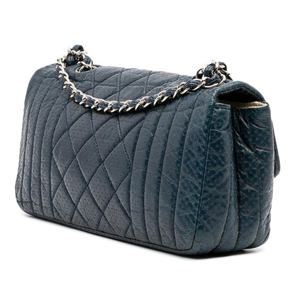 Chanel CC Quilted Perforated Aged Calfskin Flap