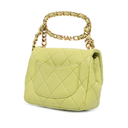 Chanel Mini Quilted Lambskin Oval Logo Chain Top Handle Flap
