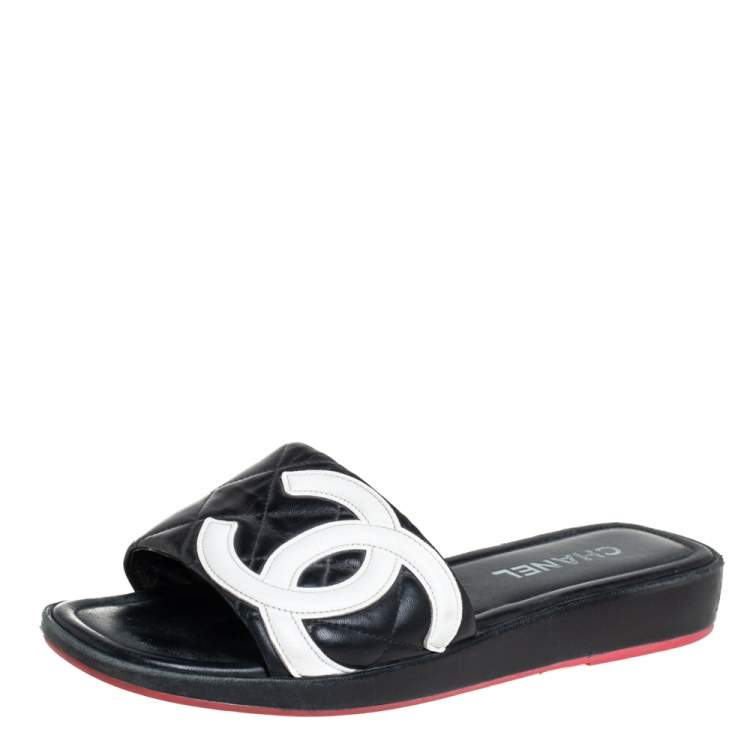 CHANEL QUILTED LEATHER CAMBON CC SLIDE SANDALS