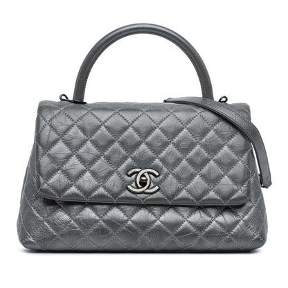Chanel Small Quilted Aged Calfskin Coco Top Handle Bag
