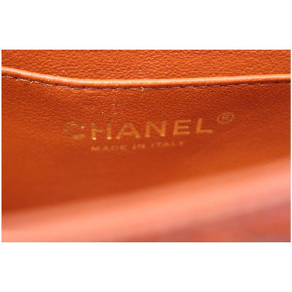 CHANEL Pearl Red Caviar Leather Mini Rectangular Flap Bag