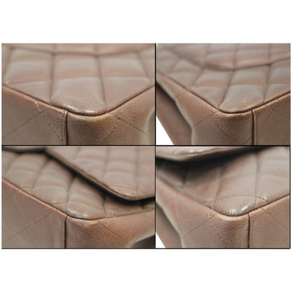 CHANEL Maxi Classic Flap Caviar Leather Shoulder Bag Brown
