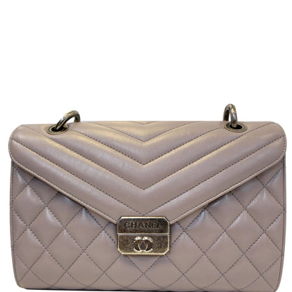 CHANEL Quilted Sheepskin Flap Bag with Handle Lilac