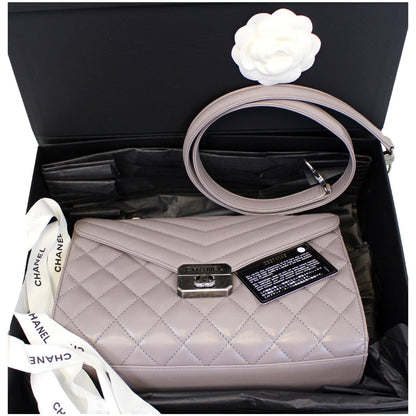 CHANEL Quilted Sheepskin Flap Bag with Handle Lilac