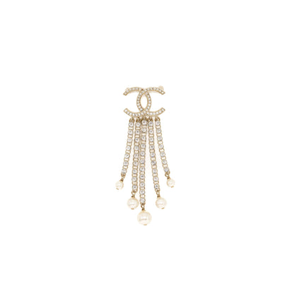 Chanel CC logo with crystal dropping brooch light gold tone