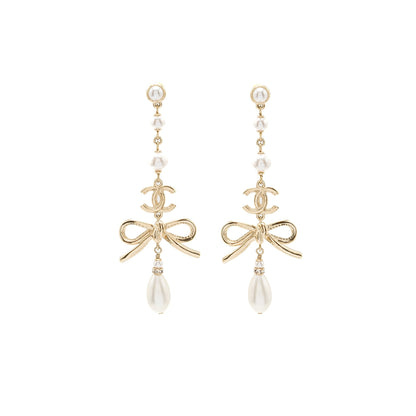 Chanel pearl / cc logo / bow tie drop earrings gold tone