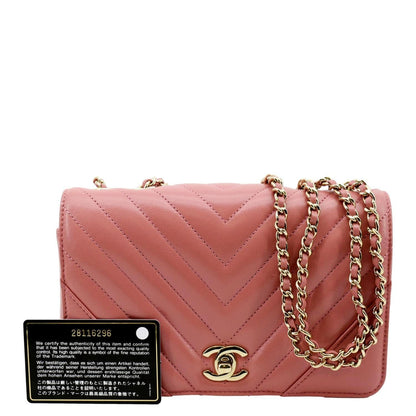 CHANEL Statement Flap Mini Quilted Chevron Crossbody Bag Pink