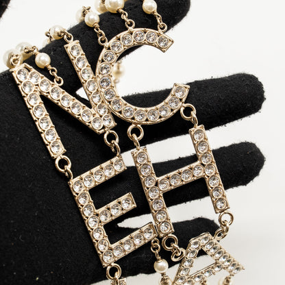 Chanel letter / pearl long giant necklace light gold tone