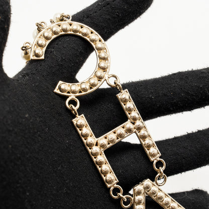 Chanel letter / pearl long giant necklace light gold tone