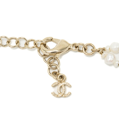 Chanel detailed letter checker blue / light gold tone