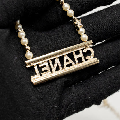 Chanel Letter Logo Necklace Crystal/Pearl Light Gold Tone