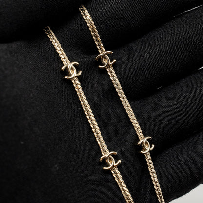 Chanel CC logo 14 motif necklace light gold tone