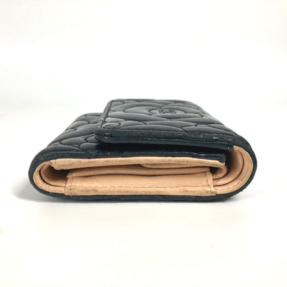 CHANEL Trifold wallet leather black By color Camelia Women