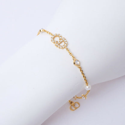 Christian Dior bracelet B0668CDCY_D301 Metal, Crystal Stone, Faux Pearl gold CD logo Claire Dee Lune Women